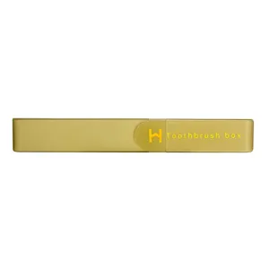 Caja de cepillo de dientes de viaje portatil con tapa, estuche dorado elegante y util.