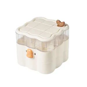 Cute multi-layer rotating jewelry storage box for rings, earrings and desktop accessories.