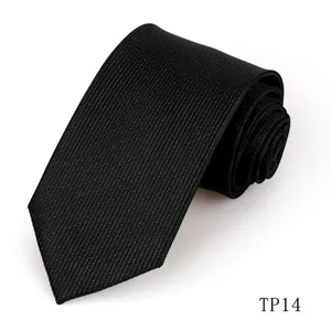 Detailed view of a black striped men tie with subtle glitter texture, fine craftsmanship style.