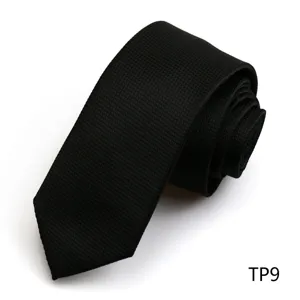 Black textured necktie detail shot, premium business style accessory for men's formal wear.