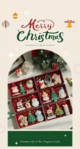 Christmas scented candle gift set featuring cute Santa, snowman and tree designs.