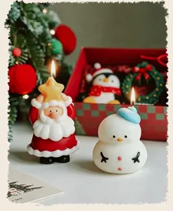 Christmas scented candle gift set with cute Santa and snowman designs for holiday decor.