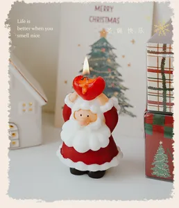 Santa Claus scented candle holding heart shape, perfect Christmas decoration gift for desktop.
