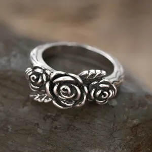 Vintage oxidized silver rose ring for women, detailed floral carved statement jewelry piece.