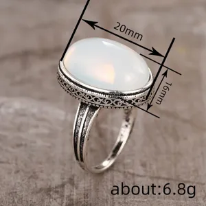 Vintage silver-plated oval imitation moonstone ring with retro carved texture 20x16mm