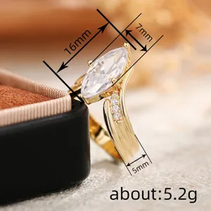 Exquisite marquise cut V-shaped ring detail shot, handcrafted modern metallic jewelry style.