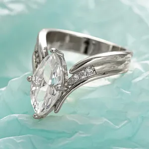 Stunning marquise cut V-shaped ring for women, sparkling cubic zirconia silver jewelry detail.