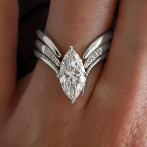 Stunning marquise cut V-shaped ring for women, sterling silver tone stackable jewelry piece.