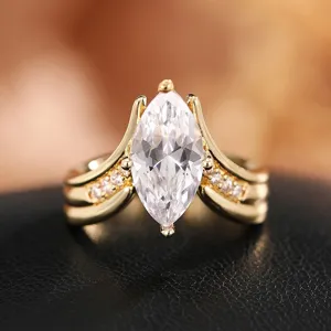 Exquisite marquise cut crystal ring featuring a chic V-shaped design and gold plated band.