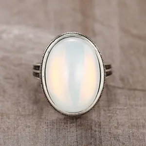 Vintage oval simulated moonstone ring detail, antique black carved silver band for women.