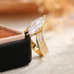 Marquise cut V-shaped ring close up detail, gold plated handcrafted luxury crystal jewelry accessory