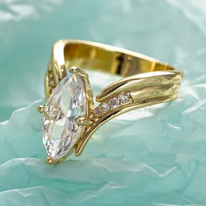 Stunning marquise cut v-shape gold ring detail, exquisite fashion jewelry piece for women.