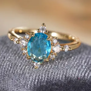 Stupefacente anello con zircone blu ovale a fiocco di neve placcato oro gioielli eleganti donna