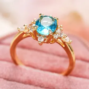 Meraviglioso anello con cristallo blu da donna placcato oro elegante gioielli di zirconi