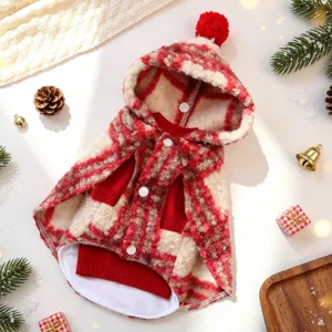 Close-up detail of the cozy red and white plaid pet Christmas cape with warm fleece lining.