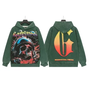 Vintage washed streetwear hoodie featuring front skull graphic and back gradient letter G logo.