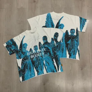 Washed white streetwear t-shirt with blue angel graphic and rhinestone lettering design.