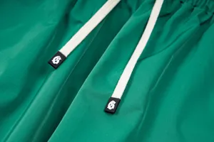 Green casual streetwear pants drawstring detail, high quality fabric, trendy design.