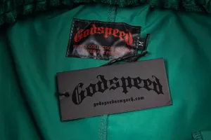 Godspeed streetwear casual long pants apparel detail view showcasing brand tag logo and collection labels.
