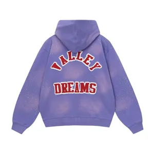 Back detail of purple wash hoodie featuring embroidered varsity text and starry effect.