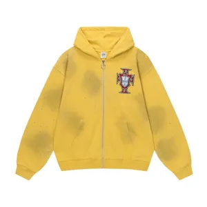 High street washed yellow zip-up hooded sweatshirt with vintage splatter effect and cool chest crest.