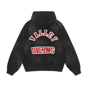 Black washed streetwear rhinestone hoodie featuring valley dreams back graphic detail style.