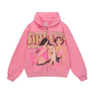 Pink Y2K aesthetic zip-up hoodie with vintage graphic print and distressed details streetwear.