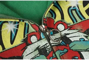 Detailed view of vintage comic print zip-up hoodie featuring contrast green lining and ring zipper.