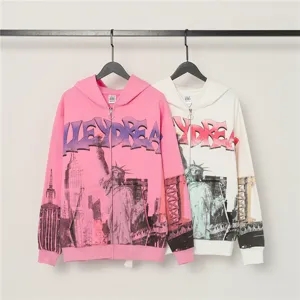 Unisex washed zip-up hoodie featuring graphic cityscape print and street style typography.