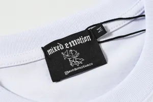 Detailed shot of t-shirt collar with brand label and size tag for casual streetwear style.