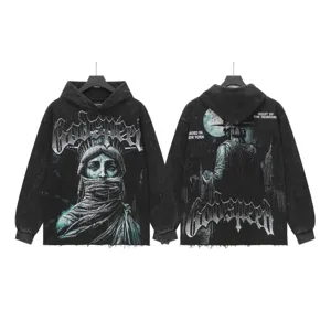 Distressed acid wash streetwear hoodie with Statue of Liberty graphic detail and text.