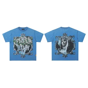 Vintage washed blue short sleeve t-shirt with rhinestones and streetwear graphic print.