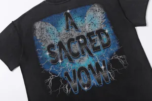 Vintage washed black t-shirt back detail with cool blue graphic print and text design.