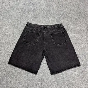 Back detail view of black washed denim shorts, straight fit casual five-quarter pants for daily.