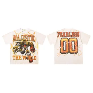 Detailed view of vintage washed streetwear t-shirt featuring bear graphic and bold text.