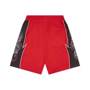 Red black colorblock casual shorts detail view with gothic side letter print and back pocket.