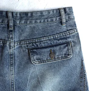 High street denim shorts detail with vintage blue wash, back pocket, star button and side studs.