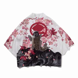 Detail shot of Japanese vintage koi fish and cherry blossom print on a casual kimono shirt.