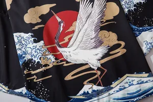 Detail view of Japanese ukiyo-e style kimono cardigan featuring classic crane and ocean wave print.