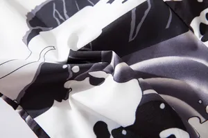 Detailed close-up view of Japanese ukiyo-e wave pattern fabric for stylish kimono shirt.