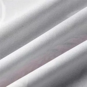 Fabric texture detail close-up showing soft weave and pattern design for apparel.