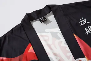 Detailed view of black Japanese cardigan collar and fabric print, casual kimono streetwear.