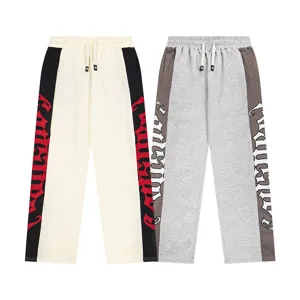 Unisex streetwear graphic sweatpants casual straight leg trousers with side panels.