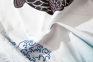 Japanese vintage ukiyo-e carp wave fabric detail for kimono cardigan apparel production.