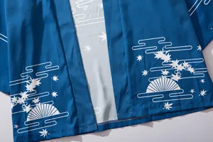 Japanese traditional style blue kimono cardigan with white maple leaf and fan print details.