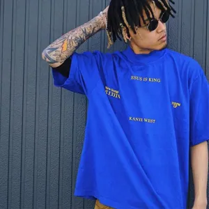 Close-up detail of the blue streetwear short sleeve t-shirt with graphic print design.