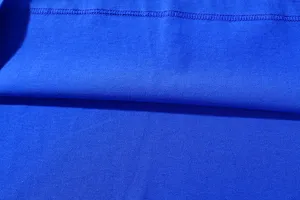 Detail view of the soft blue fabric texture and neat stitching of the casual t-shirt.