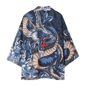 Close-up detail of Japanese dragon kimono cardigan showcasing vibrant ukiyo-e wave print.