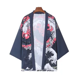 Close-up detail of the Japanese style kimono cardigan featuring wave print and loose short sleeves.