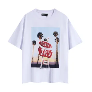 Close-up view of a white graphic t-shirt featuring a retro palm tree and bowling pin print.